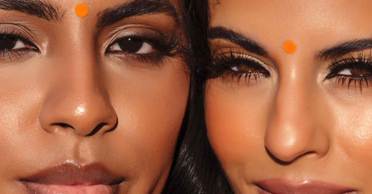 scientifically formulated skin care for women of colour, close up of two women with glowing skin